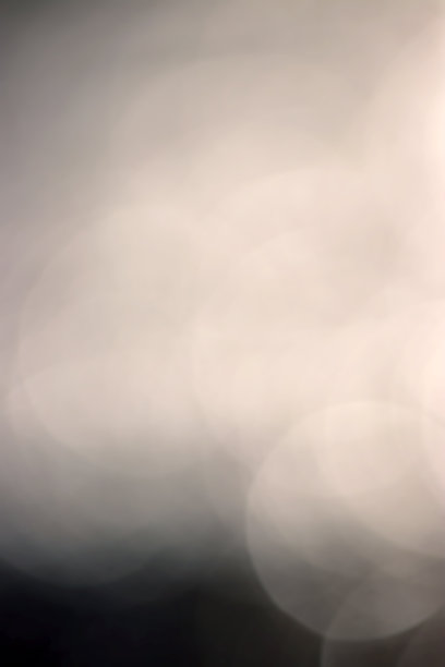 抽象的纹理与圆形光散景浮动像一个场景从黑白电影。图片下载