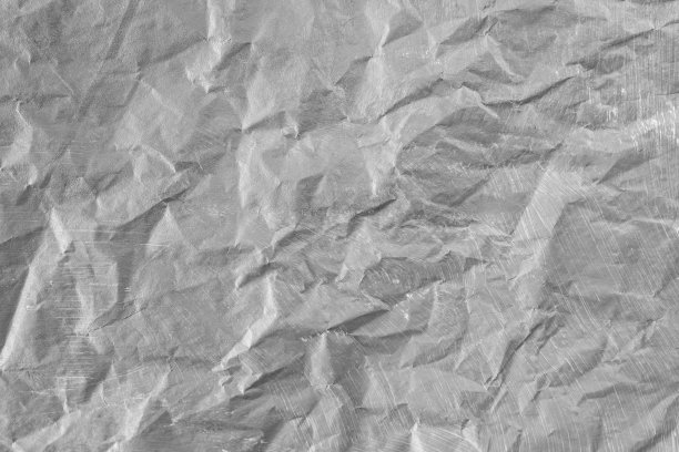 灰色的彩绘纸，皱巴巴的，撕裂的，柔和的焦点图片下载