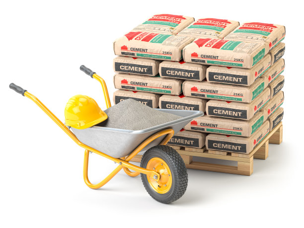 独轮车和水泥袋隔离在白色上。建筑材料。图片下载