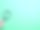俯视图图像手持放大镜对绿色背景。图片下载