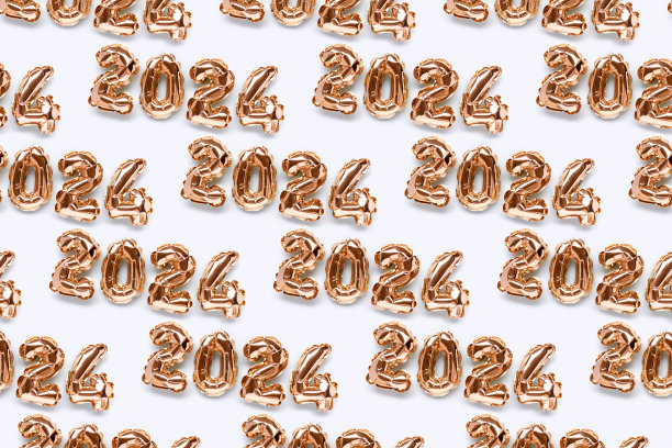 由闪闪发光的2024年金色充气气球制成的重复图案。图片下载