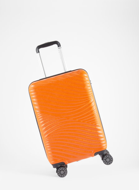 运行橙色行李箱在白色图片下载