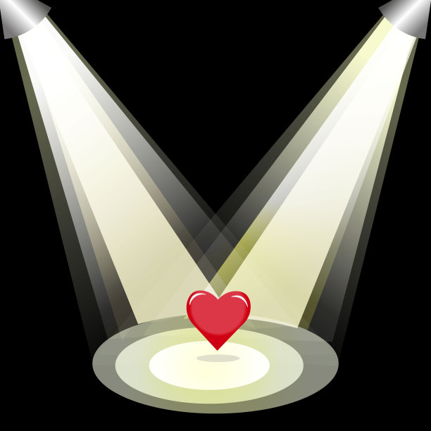 在两盏聚光灯照射下的黑色背景上，有一颗红色的心。图片下载