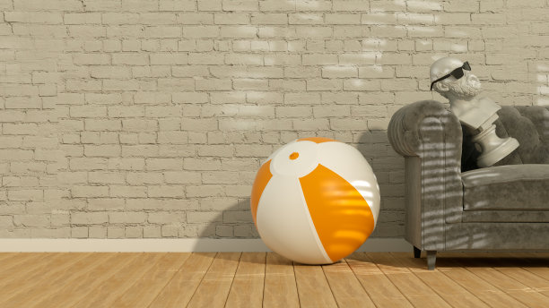 沙滩球在有空砖墙和阳光的房间，夏天的背景图片下载