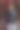 一个穿着黑色夹克和白色裤子的年轻男子的肖像，双手插在裤子口袋里图片下载