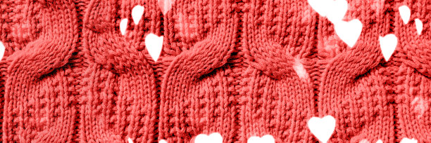 漂亮的手工针织重复图案。情人节心形的节日散景背景图片下载