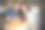 年轻夫妇家庭白人男子和亚洲妇女穿着围裙享受在家里厨房做披萨。小型商业餐厅和美食。图片下载