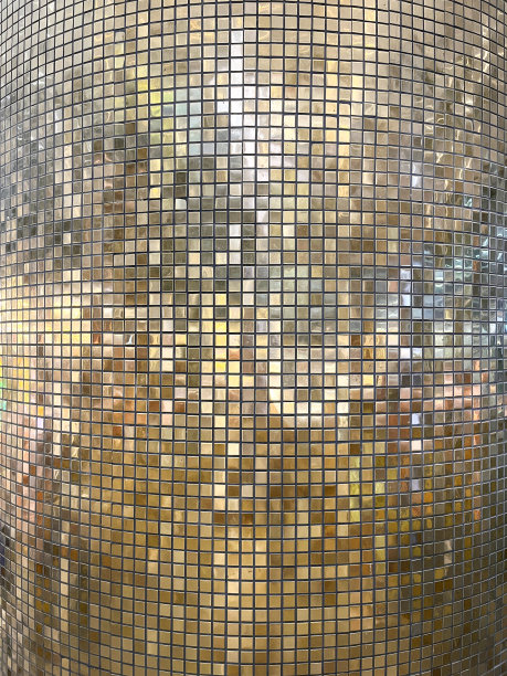 圆形圆柱上的金色马赛克纹理图片下载