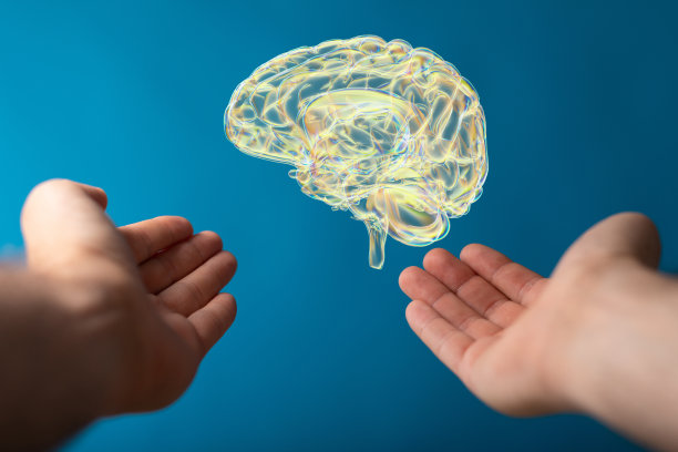 一个3d渲染的未来大脑在男人手中的特写图片下载