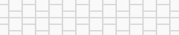 白色编织瓦横向镶嵌布局。路面纹理。厨房后挡板。浴室、淋浴或卫生间地面装饰。砖墙背景图片下载