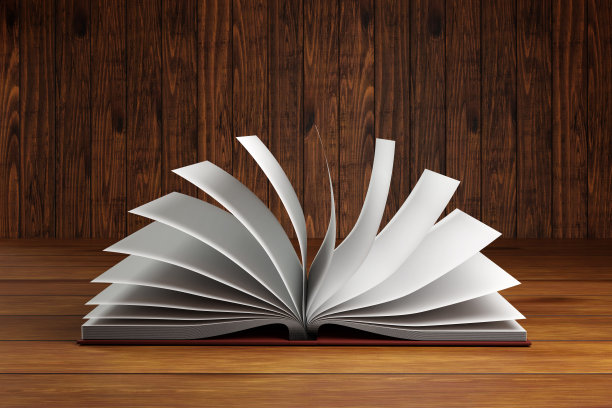 翻开木桌上的书。阅读、学习和图书馆概念的说明图片下载