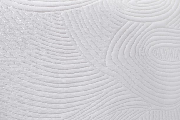 特写的白色和柔软的枕头与漂亮的图案图片下载