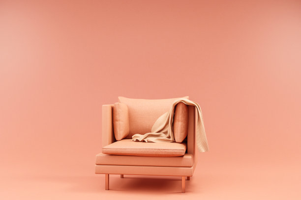 单一舒适的单色椅子站在粉色橙色无限背景;三维演示图片下载