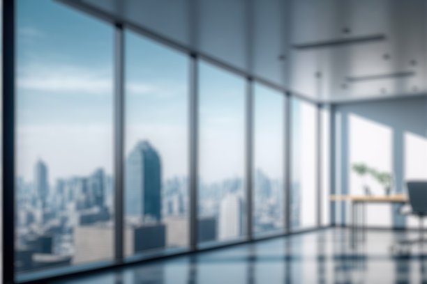 模糊背景的空现代办公室背景在市中心。工作空间室内设计。图片下载