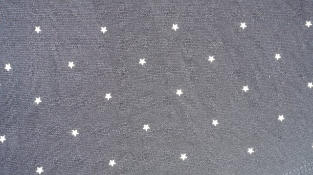 星形纹理织物布模板设计的颜色背景图片下载