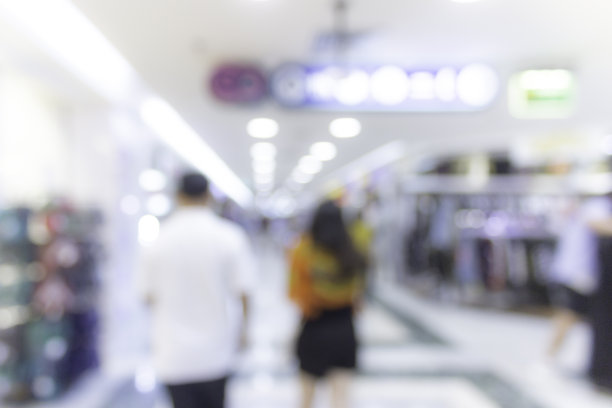 走在购物中心模糊的背景图片下载