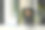 放松的年轻亚洲男子工人坐在办公室椅子上，双手抱在脑后，透过窗户看。图片下载
