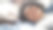 年轻快乐微笑的黑人夫妇躺在地板上，享受一个亲密的时刻。男人对他的妻子说，他们一起梦想着美好的未来。休闲生活方式概念。图片下载