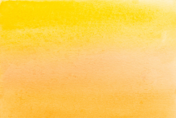 黄色和橙色水彩画在纸的背景。图片下载
