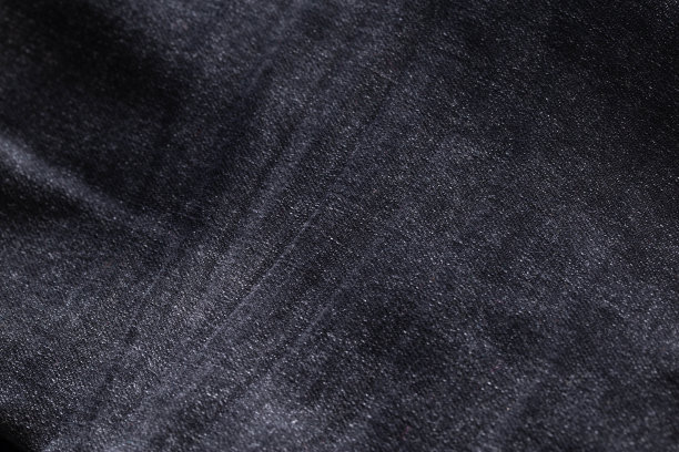 黑色牛仔裤，口袋背景，宏观。时尚图片下载