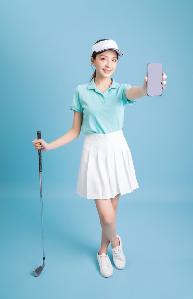 年轻的亚洲女高尔夫球手的形象图片下载