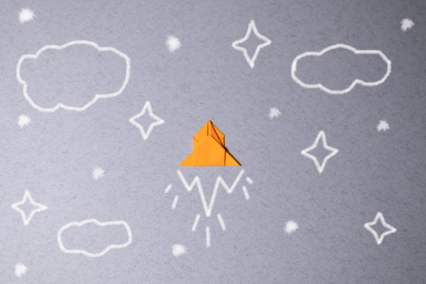 纸艺风格火箭在太空中飞行，启动概念，平面风格。图片下载