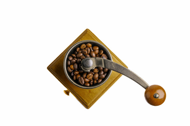老式咖啡研磨机。老式的复古手动木制和金属咖啡研磨机。手动咖啡研磨机用于研磨咖啡豆。孤立在白色背景上。图片下载