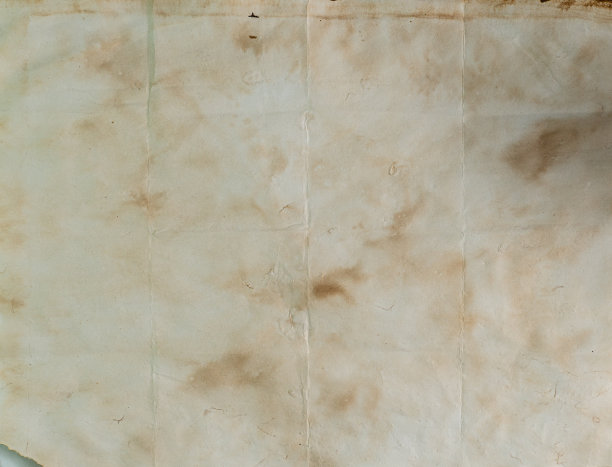 旧书或书法的一页。靠近黄色的古代羊皮纸。写作、学习和教育理念。制书用纸。图片下载