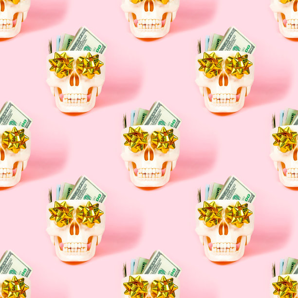 人类骷髅头骨与美元重复无缝模式的浅粉色背景图片下载