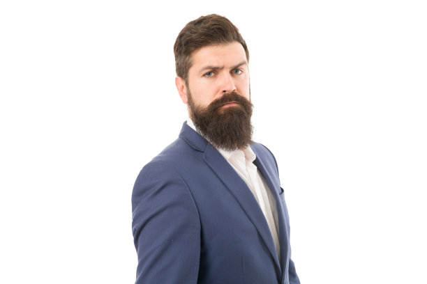 严重的大胡子。大胡子男人孤立在白色上。严肃的大胡子潮人与时尚的发型。胡子拉碴，满脸胡须的导演。让胡子更有风格图片下载