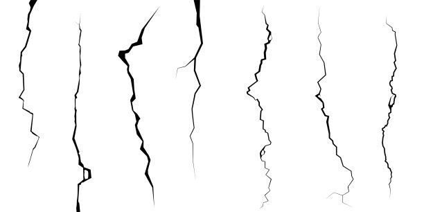 地面裂缝和裂缝，混凝土，裂缝从灾难顶视图。地震在陆地表面的断裂被隔离在白色背景上。破碎的地面、墙面、玻璃图案效果。损害图片下载