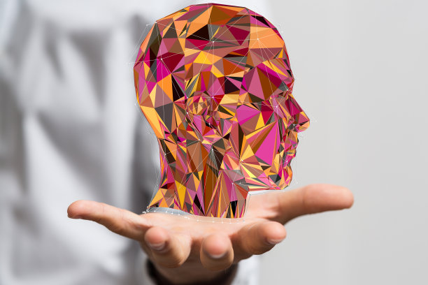 人手中的人头是一个思想、大脑、力量和能量的概念图片下载