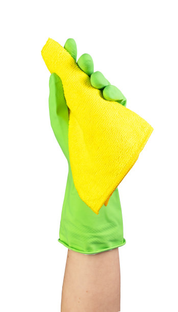 手戴手套拿着纤维布进行擦拭、清洁工作，隔离在白色背景上图片下载