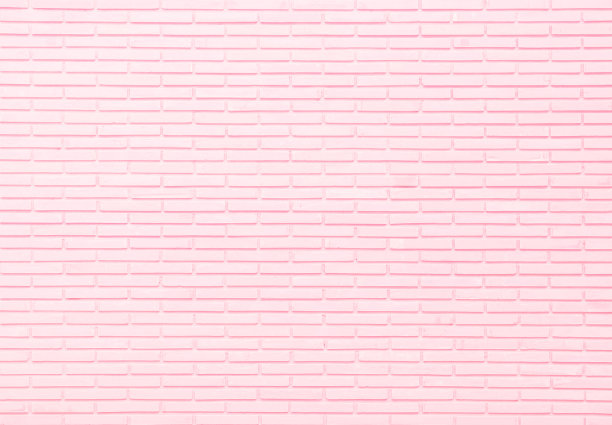 空粉色砖墙纹理的卧室背景在可爱。砖石内饰，岩石老旧干净的混凝土网格不均匀抽象风化砖设计，水平建筑壁纸。图片下载