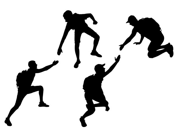 一个男性登山者向他的同伴伸出援手的剪影。经营理念图片下载