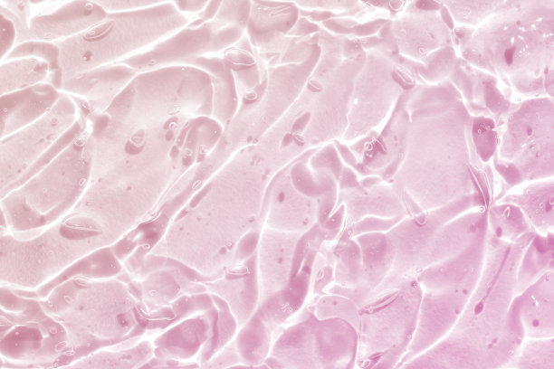 粉红色水波抽象，自然波纹和气泡纹理，凝胶肥皂，背景摄影图片下载