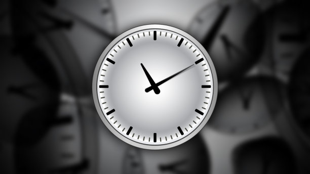 带有抽象时间隧道背景的时钟。图片下载