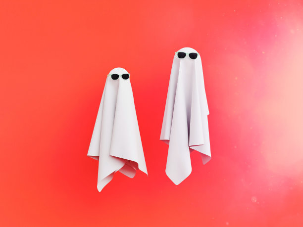 两个带着墨镜的布鬼，红色粉彩背景图片下载