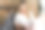 年轻漂亮的女人和衣架与不同的服装图片下载
