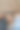 年轻漂亮的女人和衣架与不同的服装图片下载