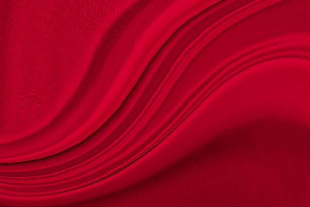 黑色红色缎面深色面料质地豪华闪亮，是抽象的丝绸布料背景与图案柔软的波浪模糊美丽。图片下载