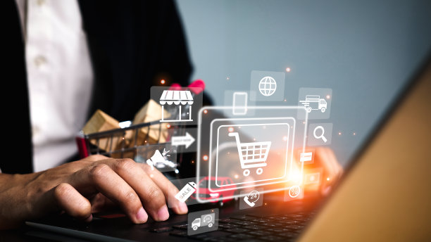 商人使用笔记本电脑在网上购物选择性关注购物车通过后台系统在线运输。图片下载