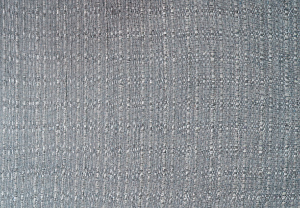 棉纺织灰色材料特写抽象散焦背景。图片下载