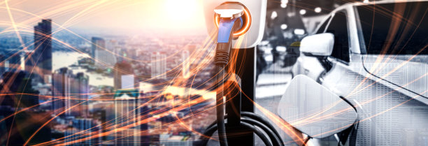 电动汽车充电站以绿色能源和可持续能源生产的生态电力为概念，供应给充电站，以减少二氧化碳排放。图片下载