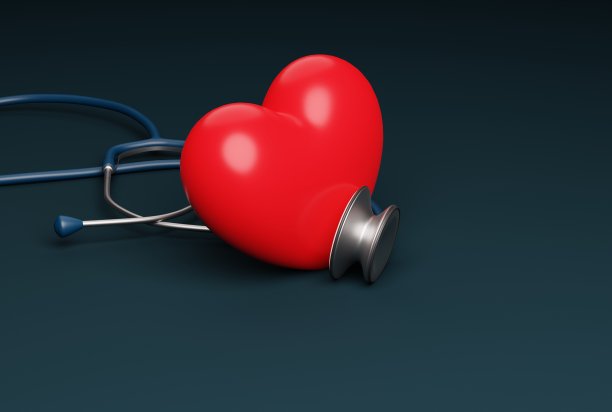 黑色背景上的心脏和听诊器。图片下载