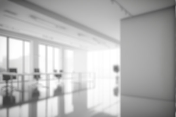 模糊背景空现代办公室背景。工作空间内部设计为白色。图片下载