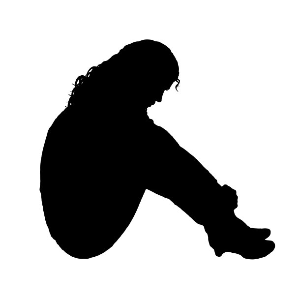 抑郁的女人坐在地板上图片下载