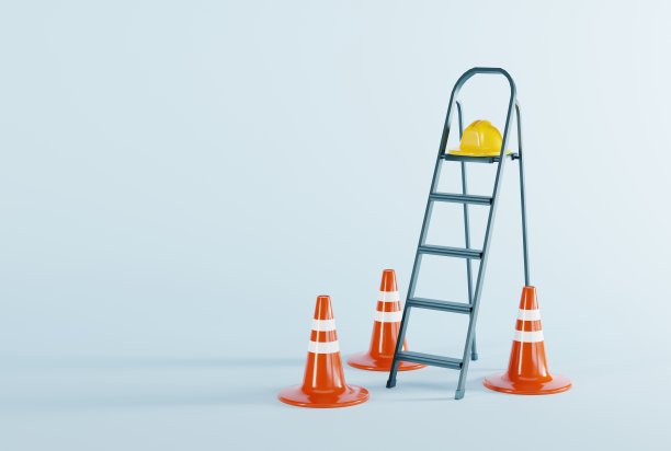 梯子，建筑头盔。翻新的概念，准备东西，建造。图片下载