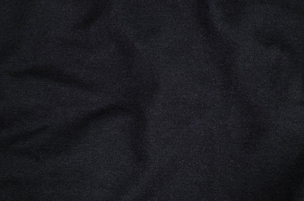 特写黑色织物的深色纹理背景。图片下载