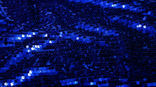 有亮片作背景的织物。闪闪发光的纹理。闪闪发光的蓝色图片下载